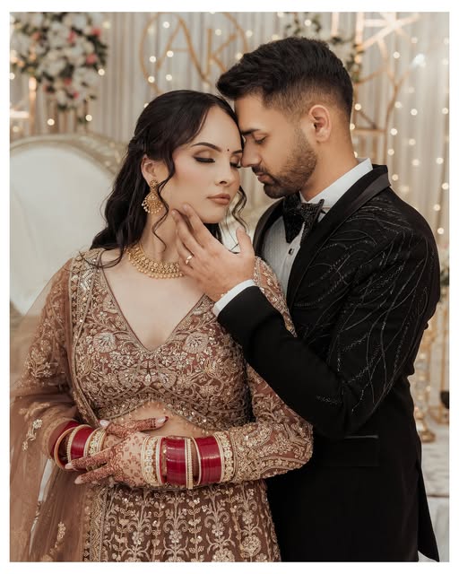Newlywed couple in an intimate wedding portrait